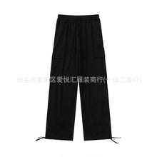 Loose Fitting Casual Straight Leg Cargo Pants With Multiple Pockets And A Drawstring Waist